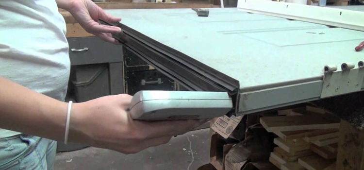 damaged steel door repair Palm River-Clair Mel